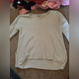 white sweater. size small